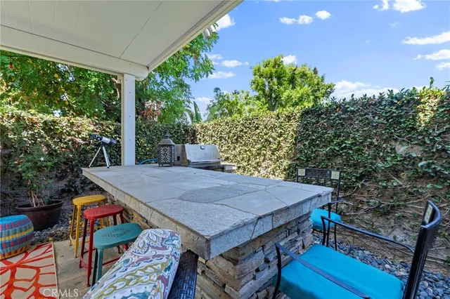 an aerial view of residential house and sandy dunes