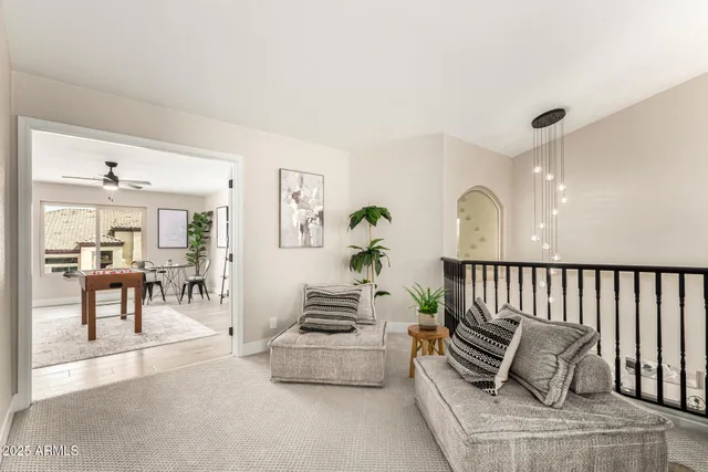 a spacious bedroom with a bed and a window