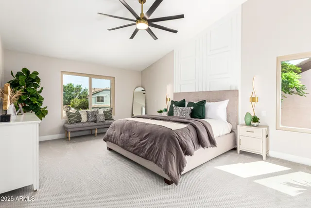 a view of empty room with ceiling fan