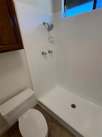 a bathroom with a sink and toilet