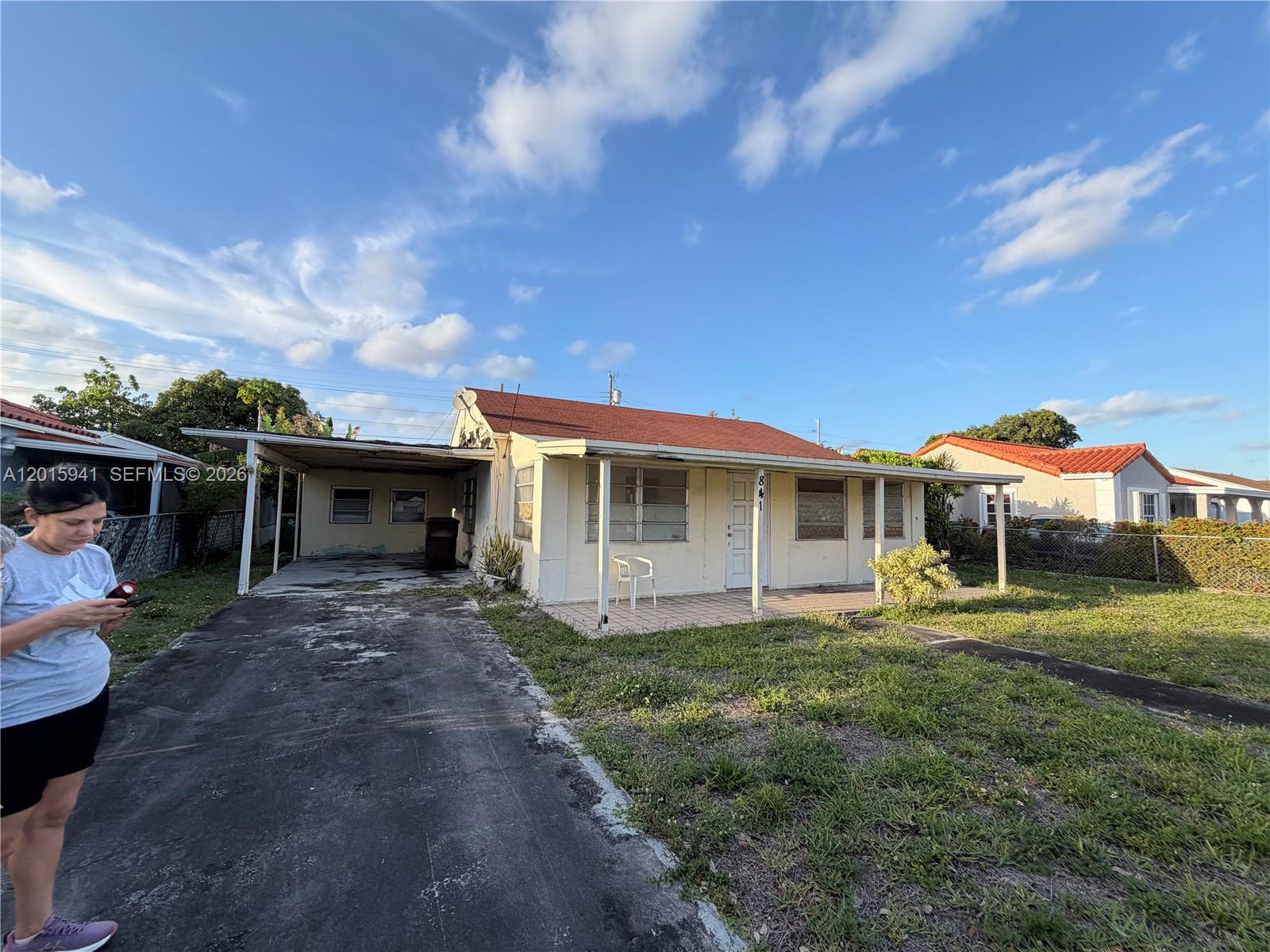 841 Northeast 4th Place Hialeah, FL 33010 - Photo 1 of 6 a view of a house with backyard and sitting area