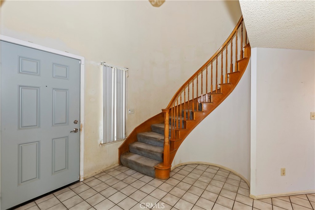 15620 Smoke Tree Street Hesperia, CA 92345 - Photo 5 of 34 a view of entryway with wooden floor