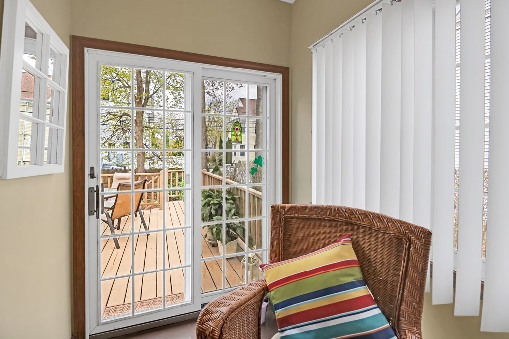 192 Maple Street Boston, MA 02132 - Photo 12 of 24 a bedroom with a bed and a window