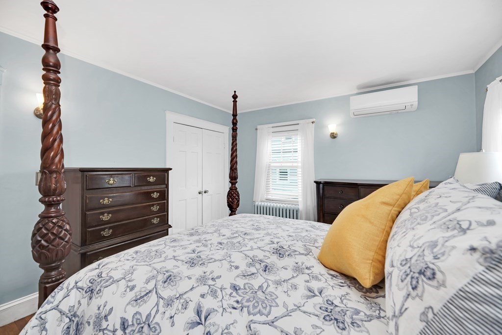 192 Maple Street Boston, MA 02132 - Photo 16 of 24 a bedroom with a bed and a closet