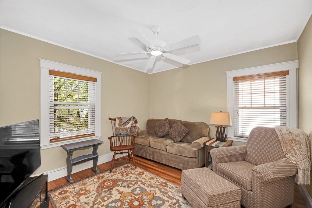 192 Maple Street Boston, MA 02132 - Photo 17 of 24 a living room with furniture and a window