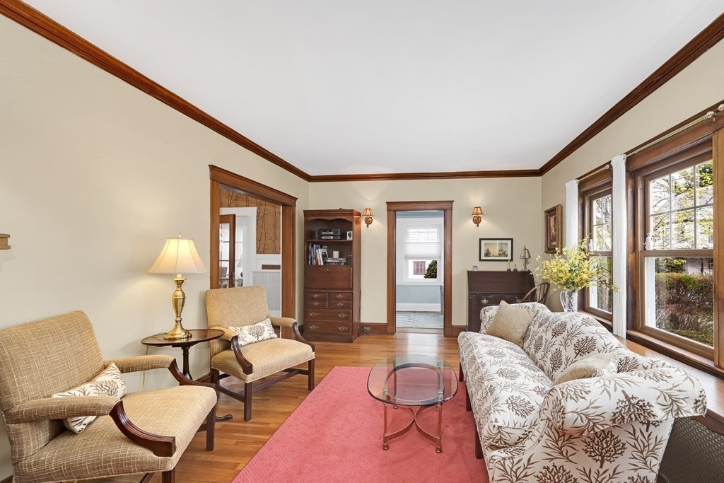 192 Maple Street Boston, MA 02132 - Photo 5 of 24 a living room with furniture and a table