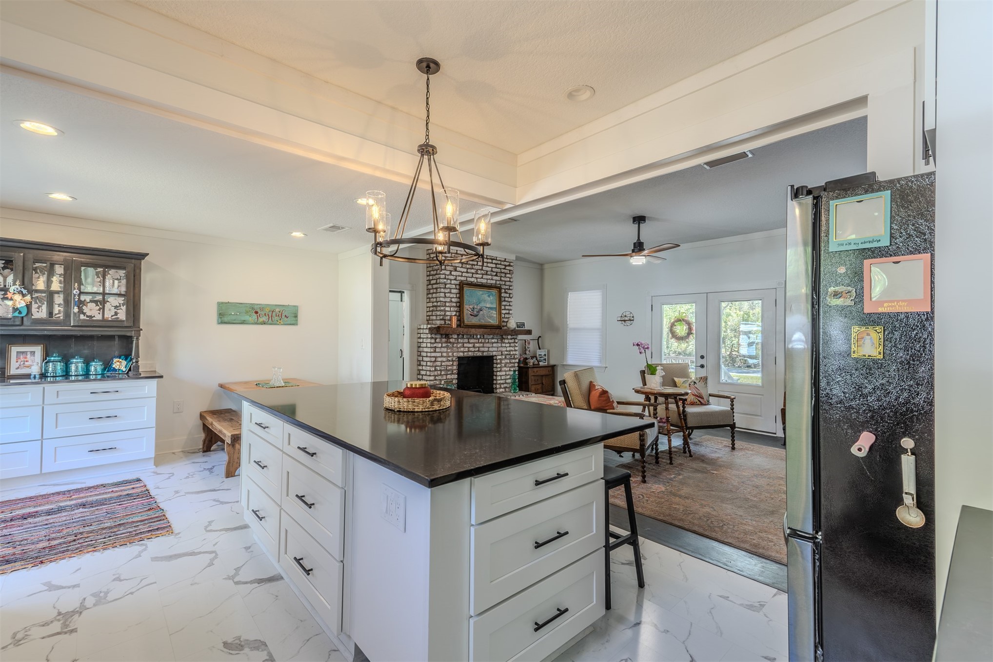 28180 Lake Hampton Road Hilliard, FL 32046 - Photo 14 of 34 a kitchen that has a lot of cabinets a sink and appliances in it