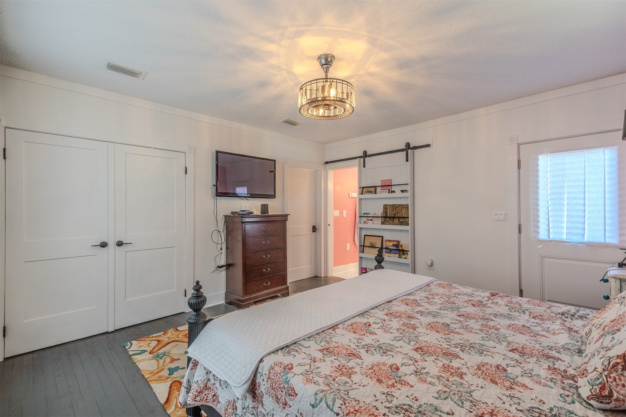 28180 Lake Hampton Road Hilliard, FL 32046 - Photo 17 of 34 a bedroom with a bed and a window