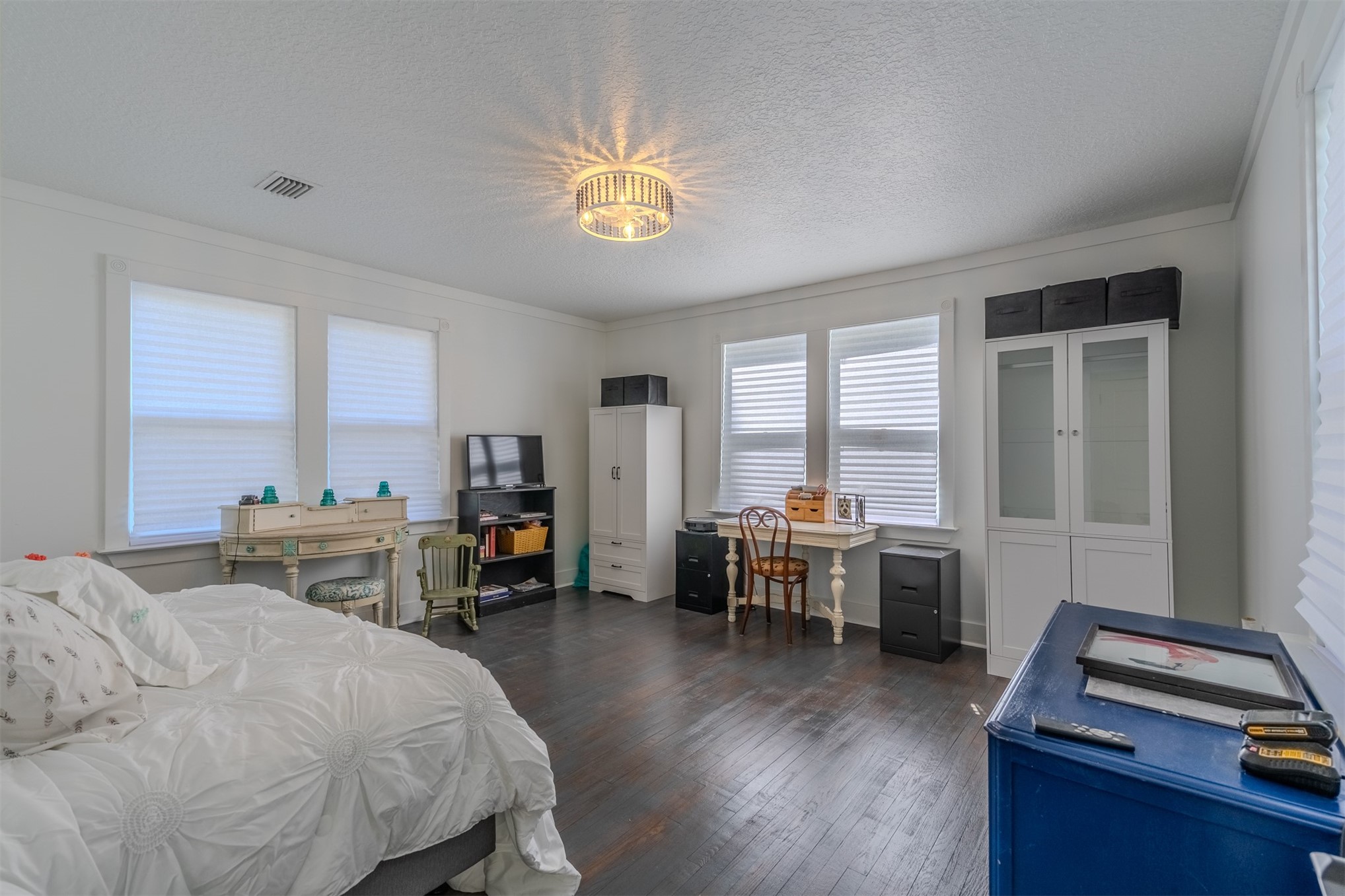 28180 Lake Hampton Road Hilliard, FL 32046 - Photo 21 of 34 a bed room with a bed and a chair