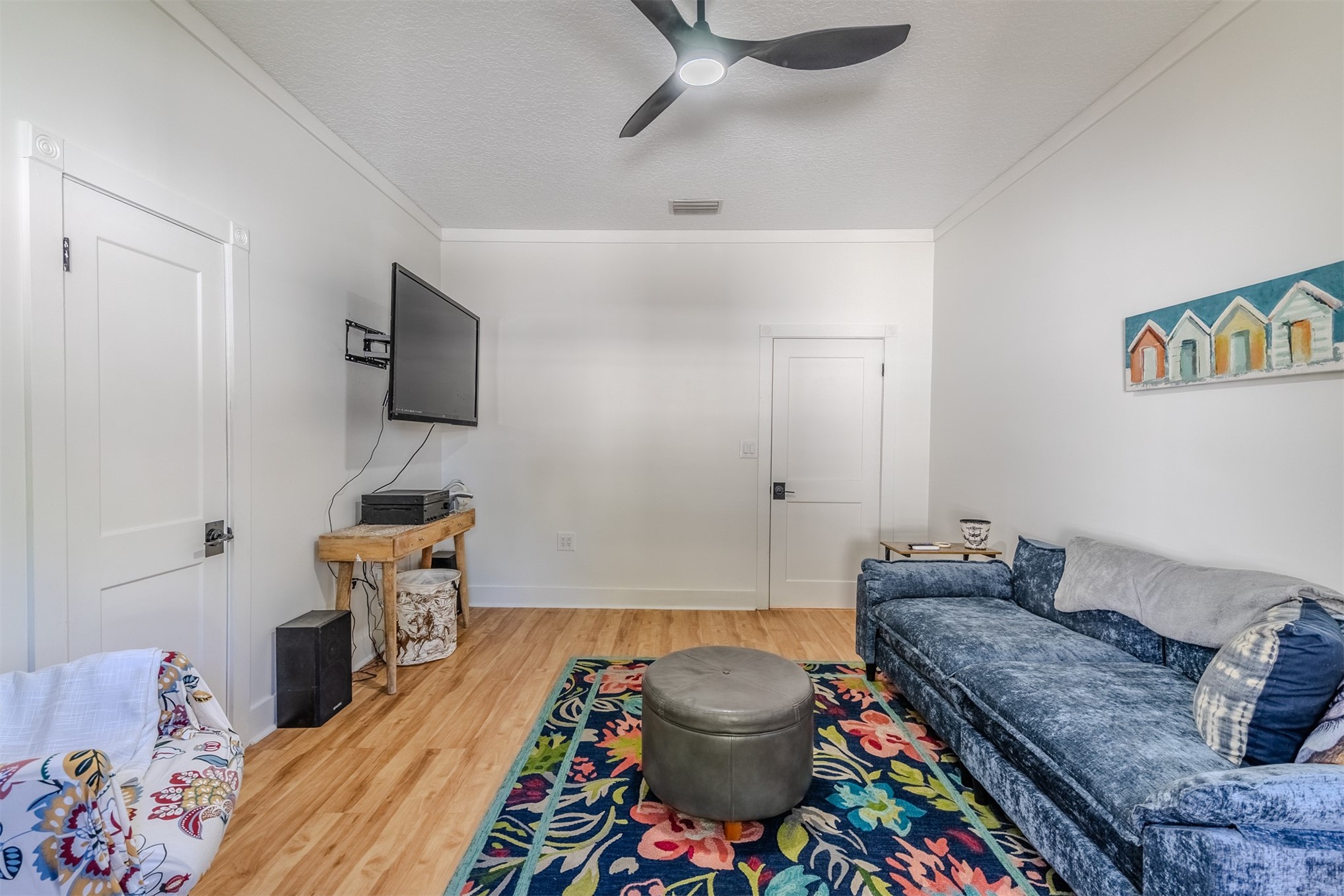 28180 Lake Hampton Road Hilliard, FL 32046 - Photo 25 of 34 a bedroom with a bed and flat screen tv