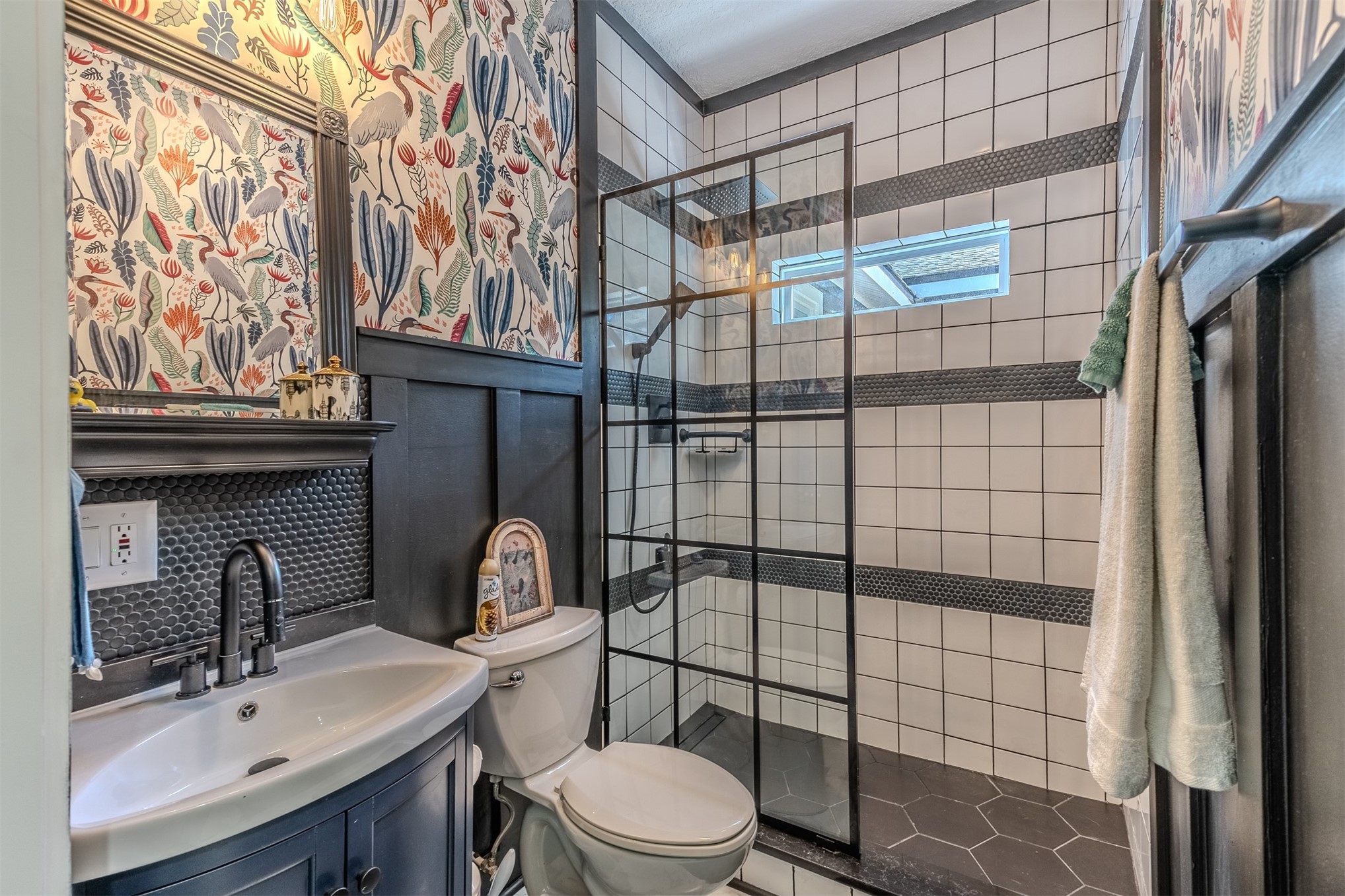 28180 Lake Hampton Road Hilliard, FL 32046 - Photo 26 of 34 a bathroom with a sink toilet and shower