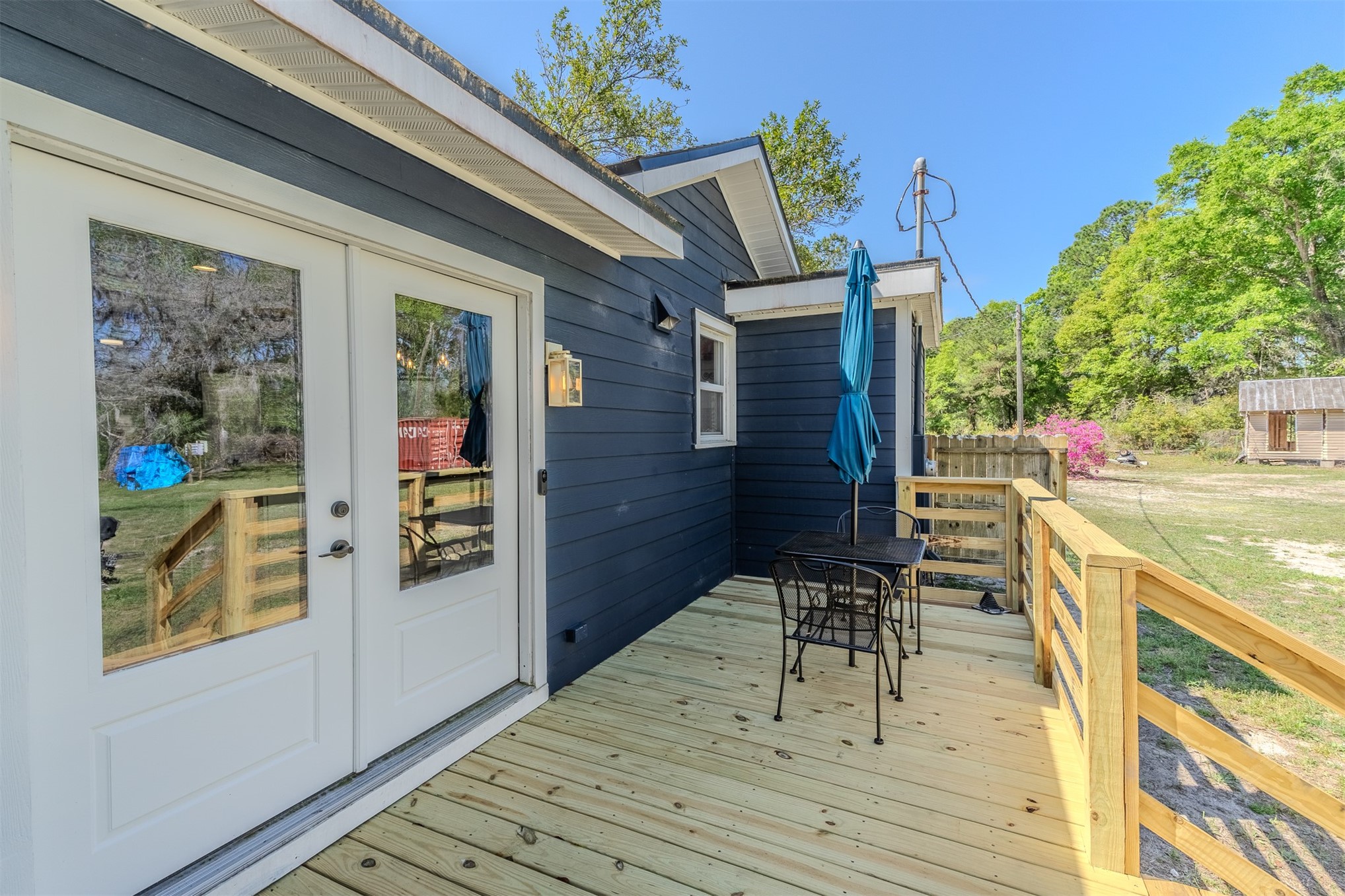 28180 Lake Hampton Road Hilliard, FL 32046 - Photo 31 of 34 a balcony view with a outdoor seating space