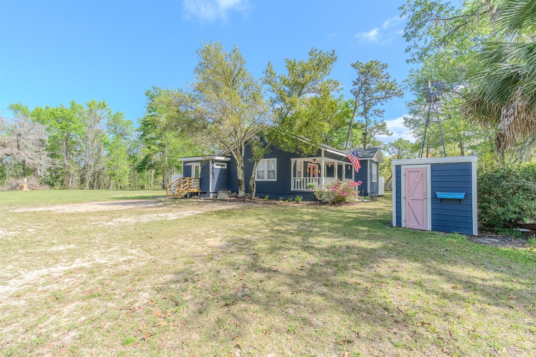 28180 Lake Hampton Road Hilliard, FL 32046 - Photo 34 of 34 a view of a house with backyard and tree