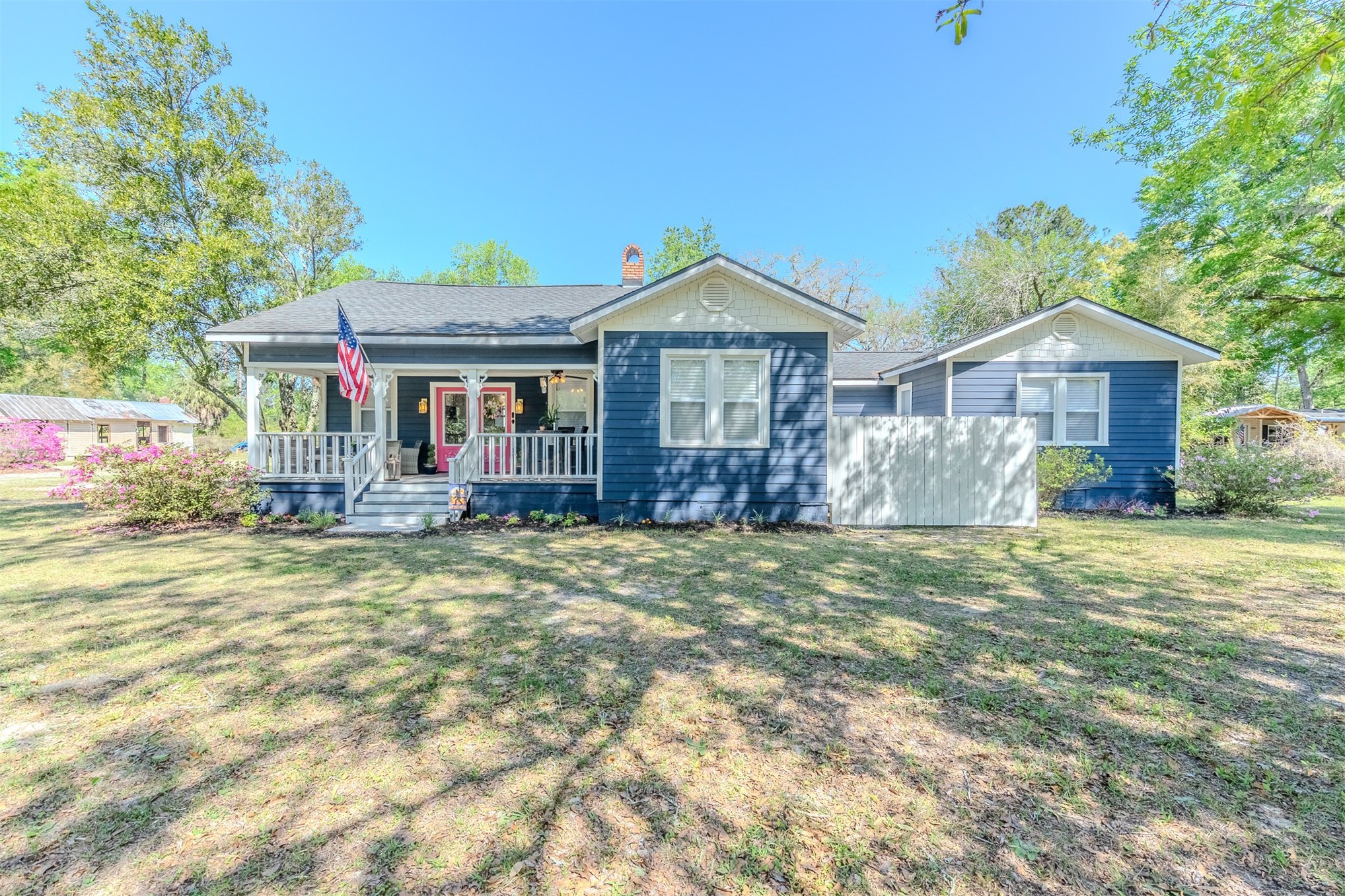 28180 Lake Hampton Road Hilliard, FL 32046 - Photo 4 of 34 a front view of a house with garden