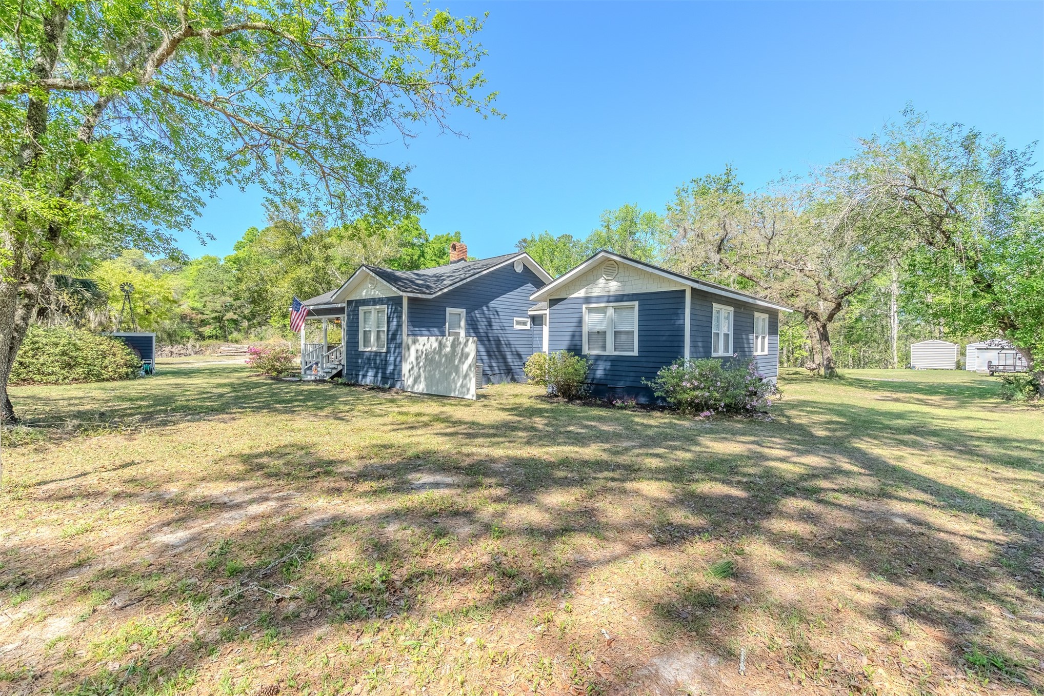 28180 Lake Hampton Road Hilliard, FL 32046 - Photo 5 of 34 a view of a house with a yard