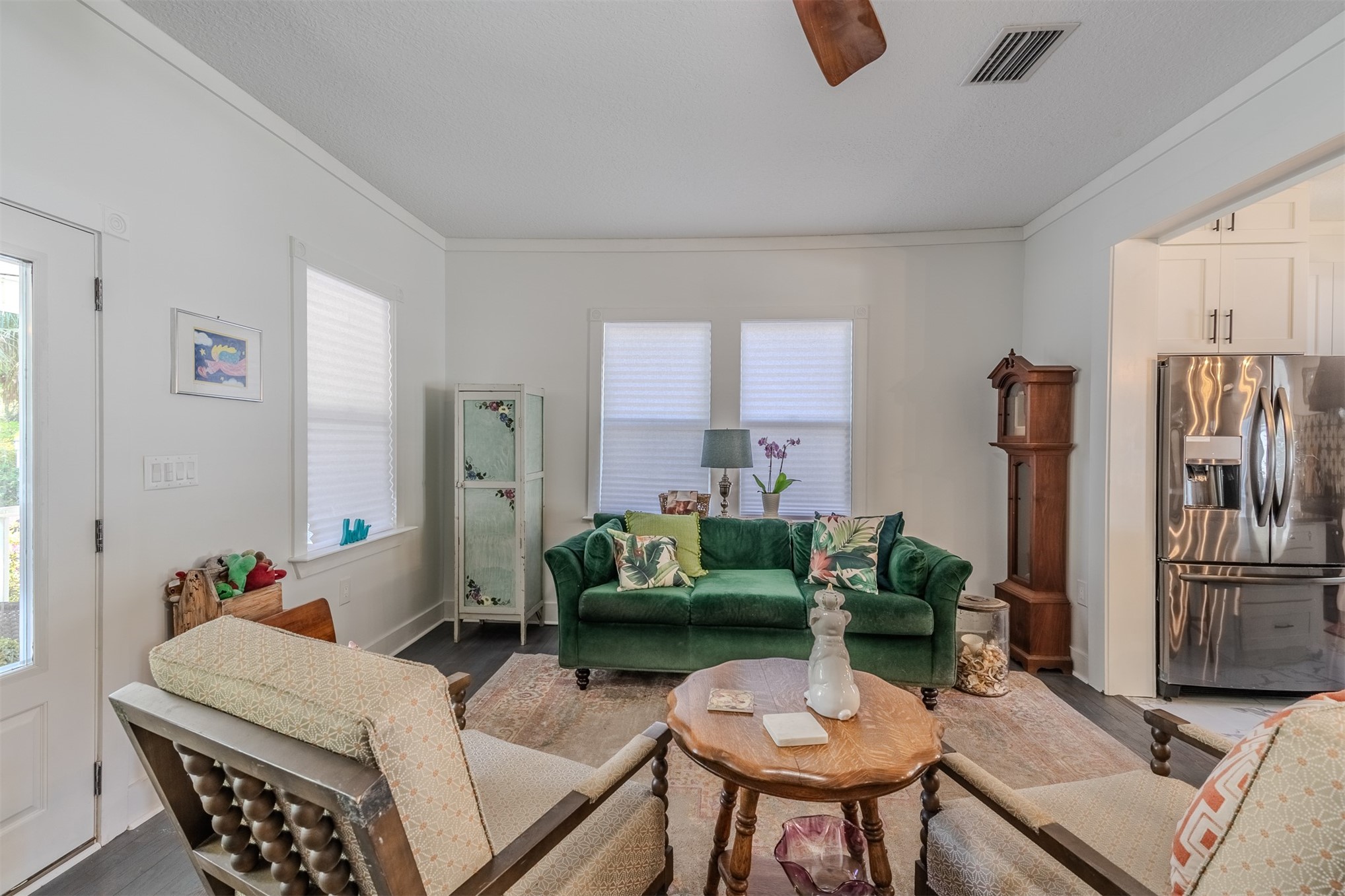 28180 Lake Hampton Road Hilliard, FL 32046 - Photo 9 of 34 a living room with furniture and a potted plant