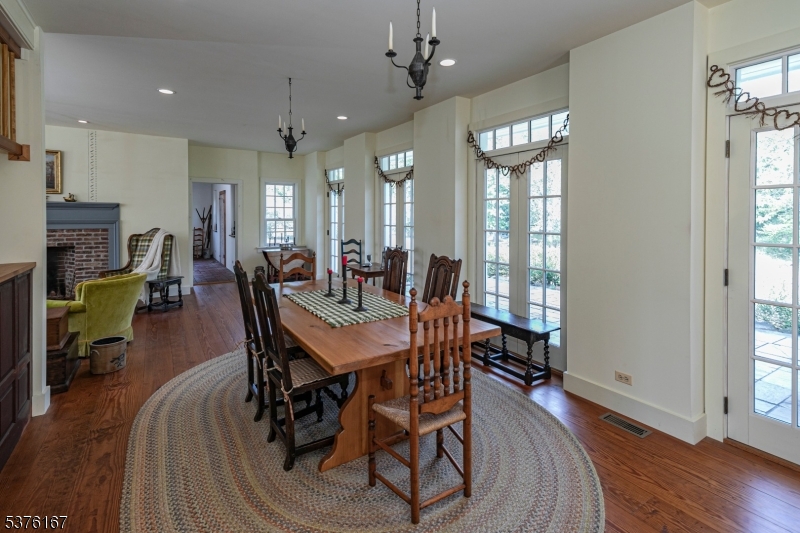348 Rosemont Ringoes Road Stockton, NJ 08559 - Photo 14 of 42 a view of a dining room with furniture window and wooden floor