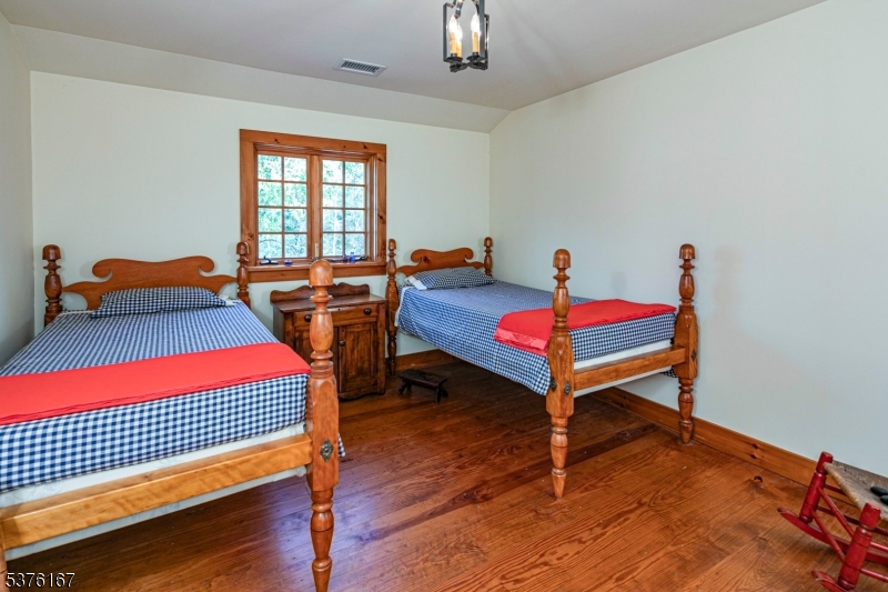 348 Rosemont Ringoes Road Stockton, NJ 08559 - Photo 32 of 42 a bedroom with a bed and window