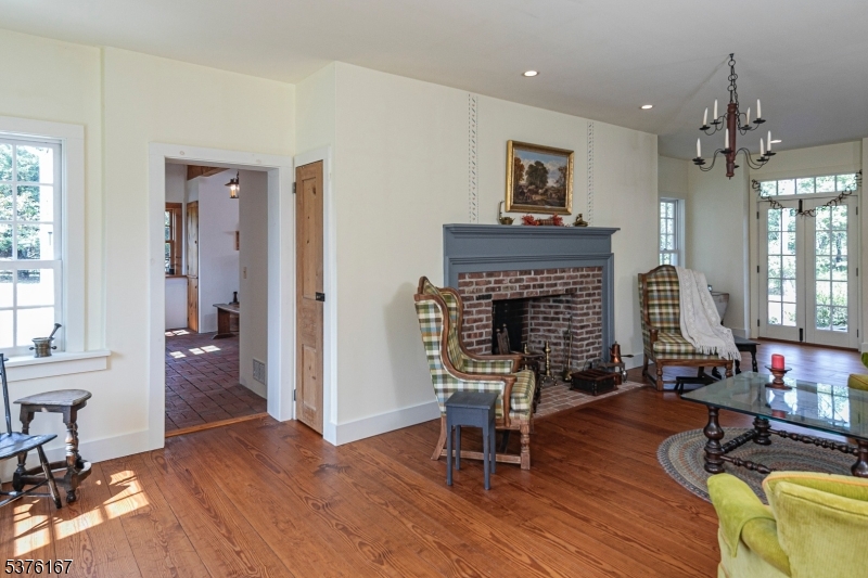 348 Rosemont Ringoes Road Stockton, NJ 08559 - Photo 10 of 42 a living room with furniture and a fireplace