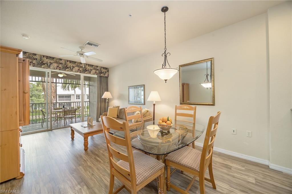 7920 Mahogany Run Lane, Unit 1024 Naples, FL 34113 - Photo 10 of 28 Enjoy serene lake views while sipping your morning coffee or relaxing with a refreshing drink at the end of a day of golf.