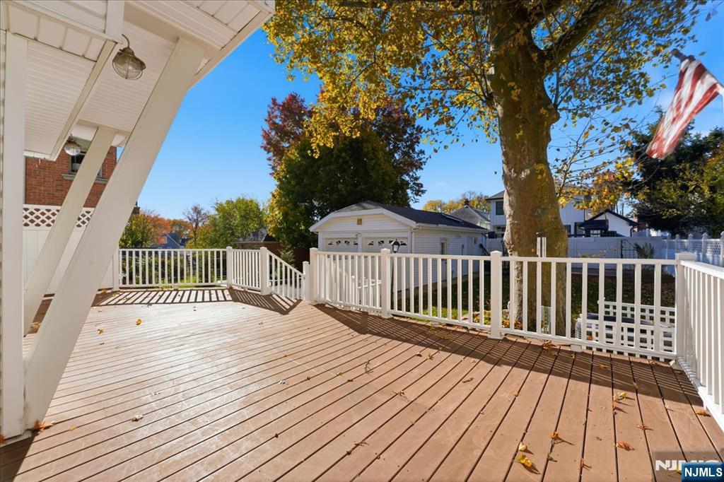 85 Beckwith Place, Unit 1 Rutherford, NJ 07070 - Photo 15 of 20 a view of a wooden deck