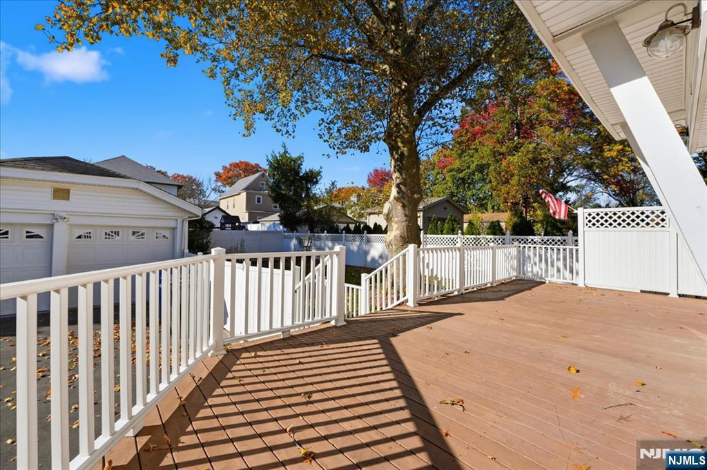 85 Beckwith Place, Unit 1 Rutherford, NJ 07070 - Photo 16 of 20 a balcony view with a garden