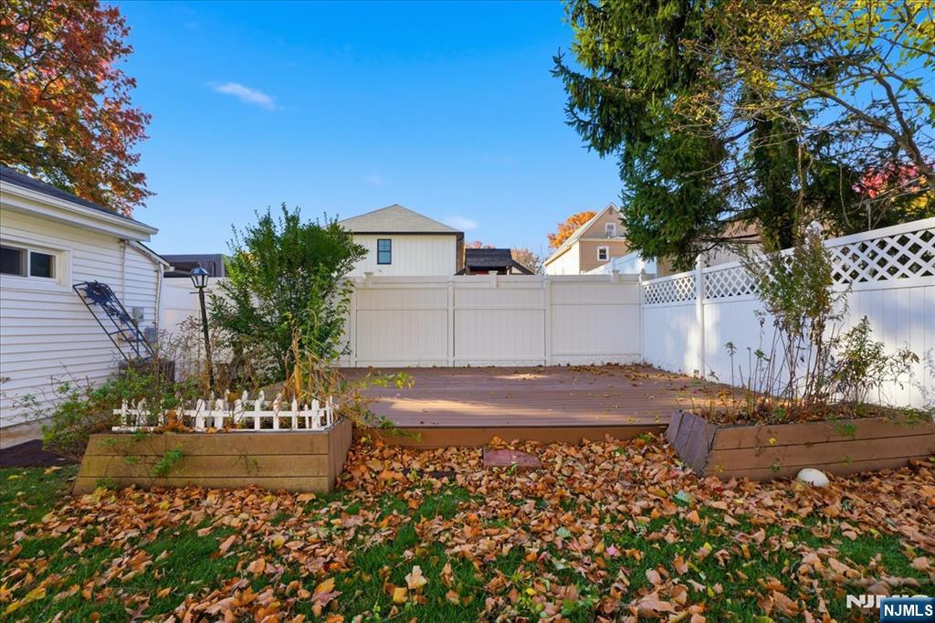 85 Beckwith Place, Unit 1 Rutherford, NJ 07070 - Photo 19 of 20 a view of a house with a yard