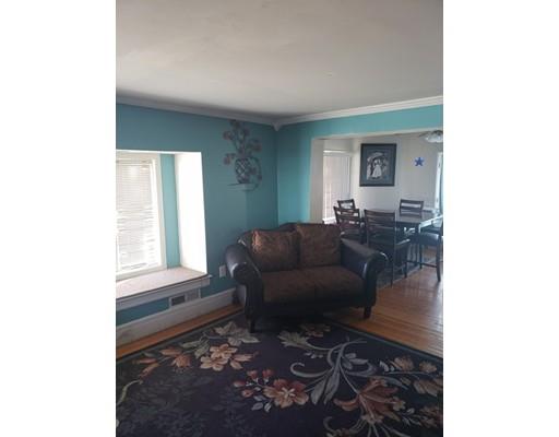 54 Chase Avenue Springfield, MA 01108 - Photo 4 of 10 a living room with furniture and a window