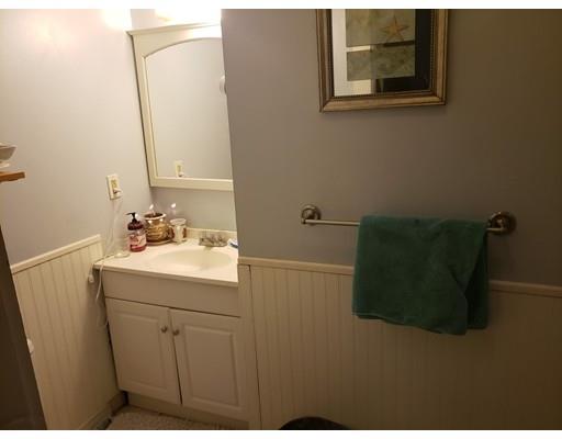 54 Chase Avenue Springfield, MA 01108 - Photo 8 of 10 a bathroom with a sink and mirror