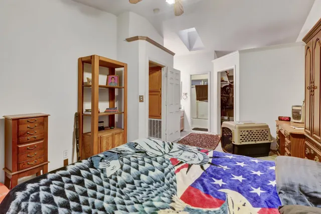 a bathroom with a sink vanity and mirror