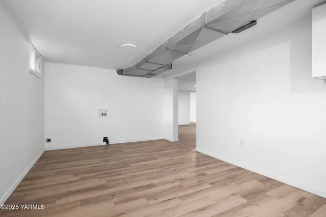 a view of a hallway with a outdoor space