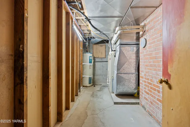 a storage room with wooden shelves