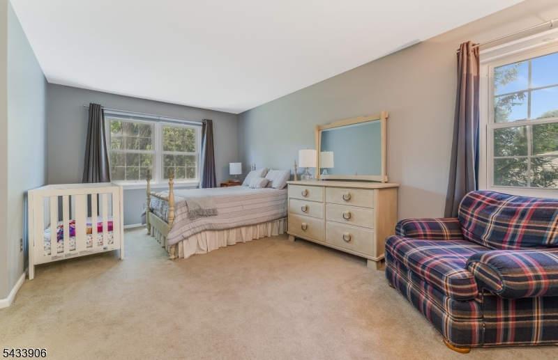 14 Lexington Road Annandale, NJ 08801 - Photo 28 of 47 a bedroom with a bed and a window
