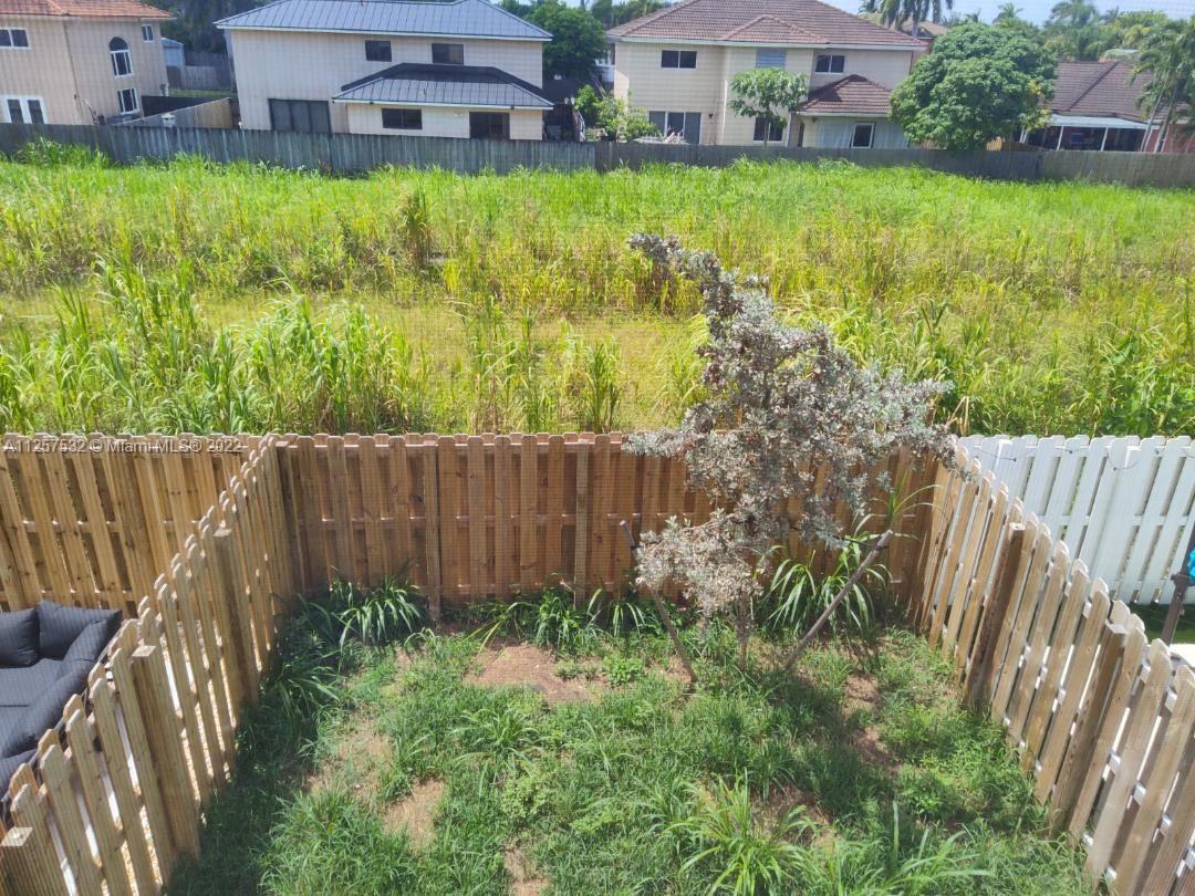 18232 Southwest 148th Road Miami, FL 33187 - Photo 27 of 32 a view of outdoor space and yard