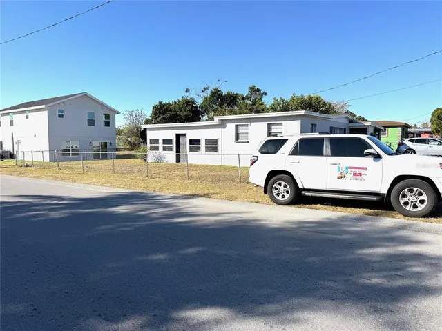 a view of a house with a ocean view
