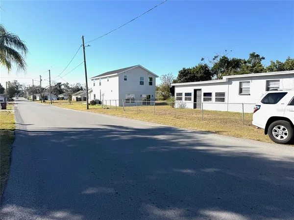 a view of a house with a ocean view