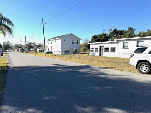 a view of a house with a ocean view