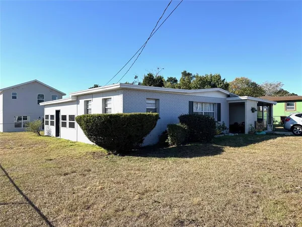 a view of house with outdoor space and sitting space