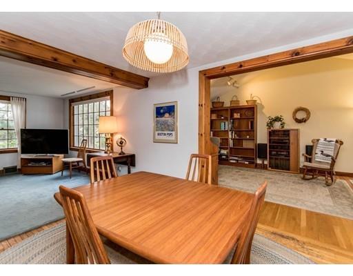 1380 Trapelo Road Waltham, MA 02451 - Photo 15 of 31 a living room with furniture a flat screen tv and a large window