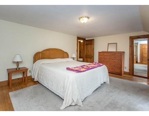 1380 Trapelo Road Waltham, MA 02451 - Photo 17 of 31 a bedroom with a bed and a couch