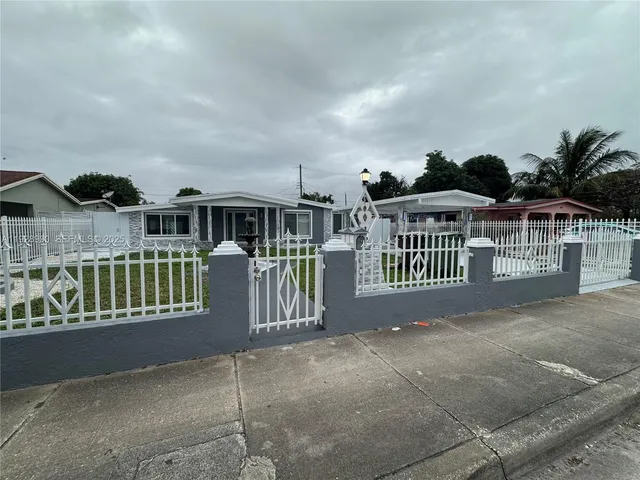 a view of a house with a roof deck