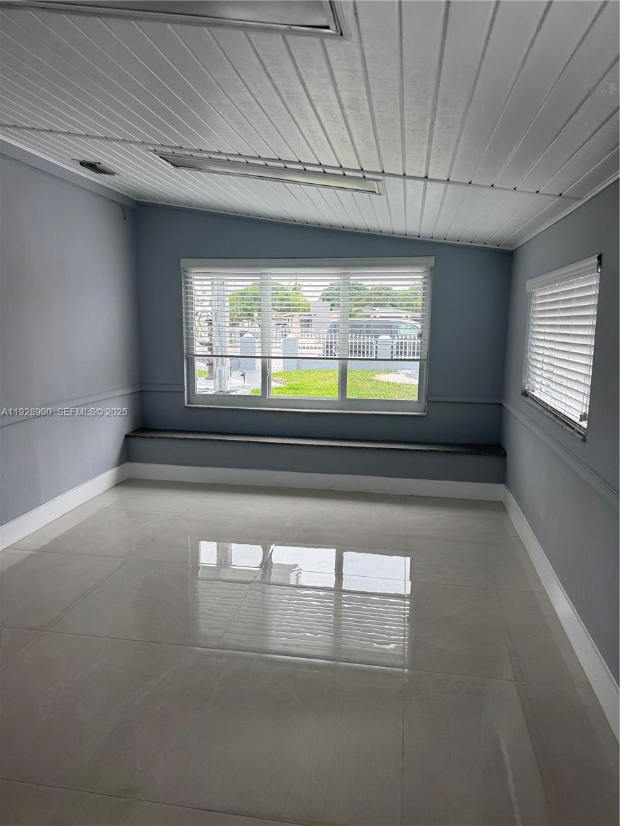 881 Hialeah Drive Hialeah, FL 33010 - Photo 11 of 36 a view of hall way with furniture