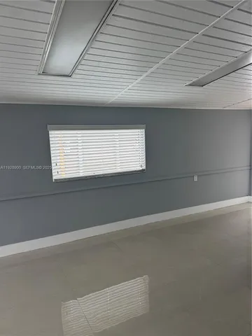 a view of a room with an empty space