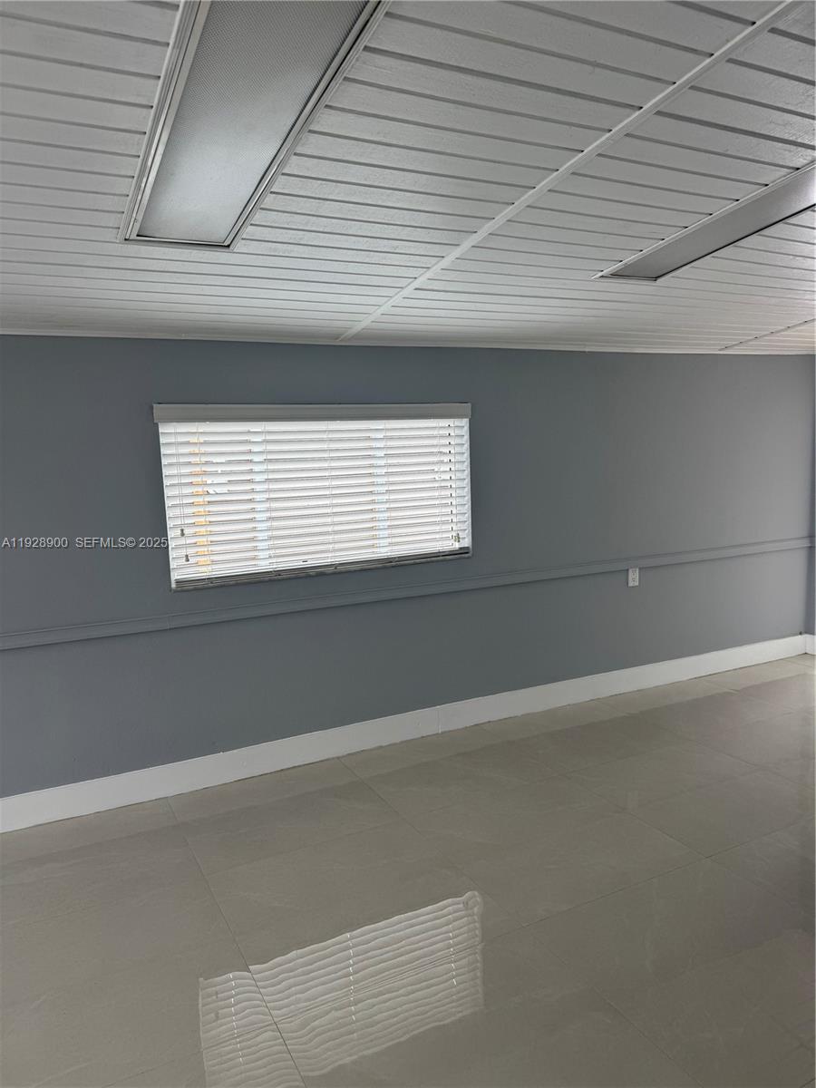 881 Hialeah Drive Hialeah, FL 33010 - Photo 12 of 36 a view of empty room with window