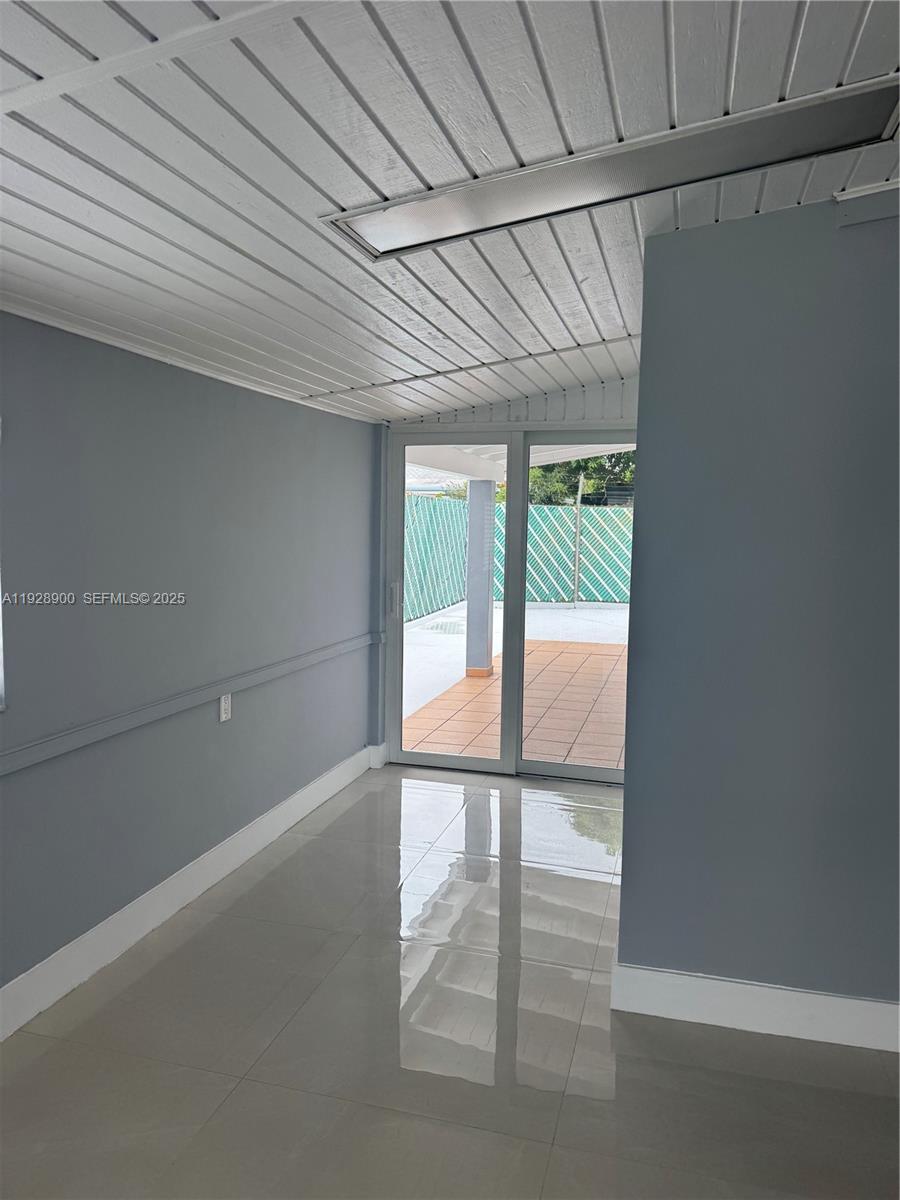 881 Hialeah Drive Hialeah, FL 33010 - Photo 13 of 36 a view of a room with an empty space