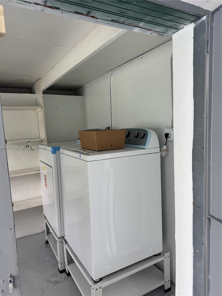 881 Hialeah Drive Hialeah, FL 33010 - Photo 30 of 36 a utility room with dryer and washer