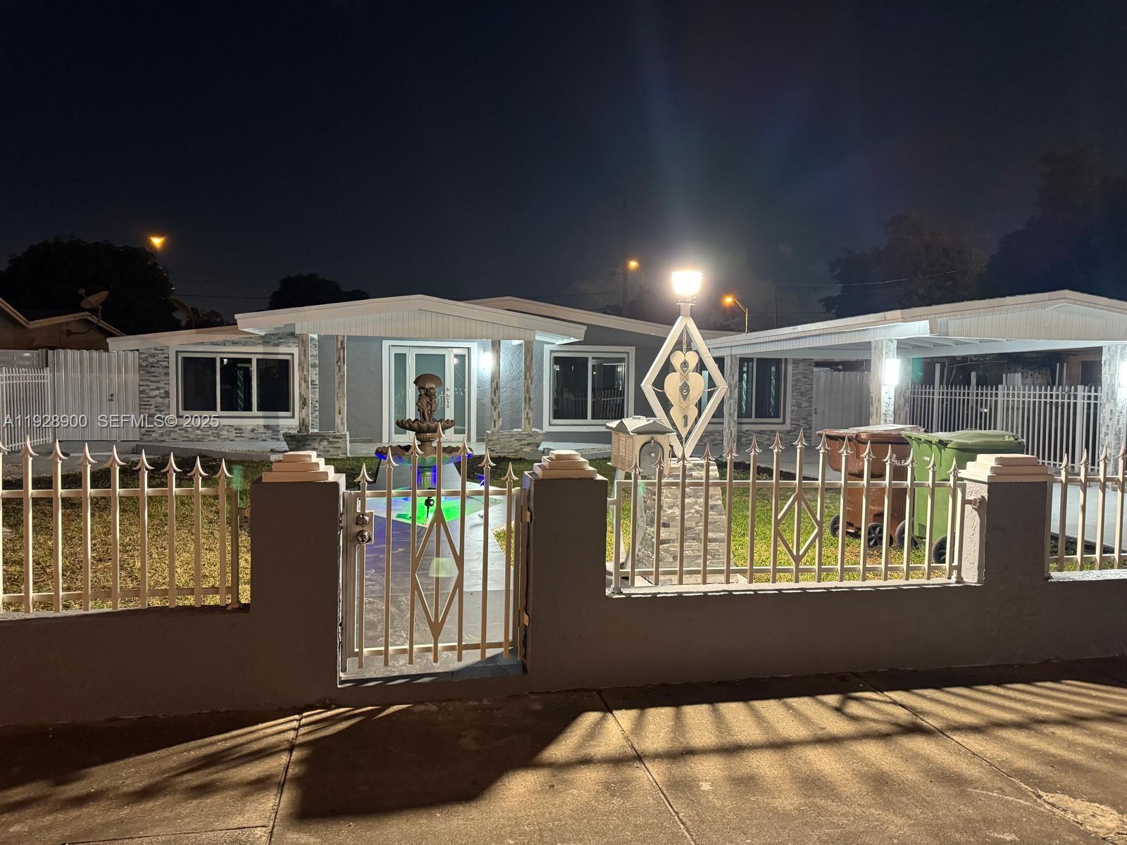881 Hialeah Drive Hialeah, FL 33010 - Photo 34 of 36 a front view of a house with a porch