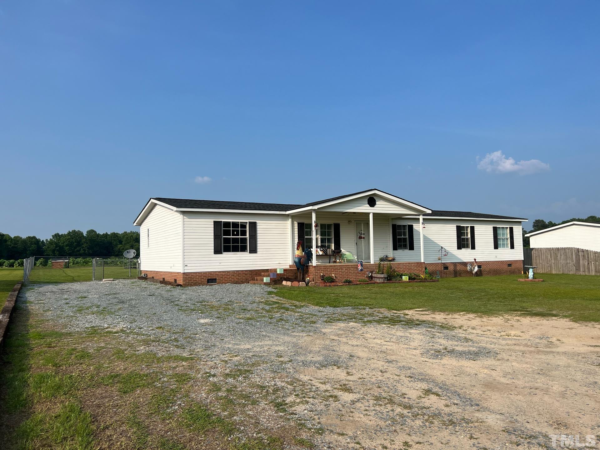 4516 North Spring Branch Road Dunn, NC 28334 - Photo 1 of 21 Doublewide is FHA ready. Front porch and rear porch and above ground pool.