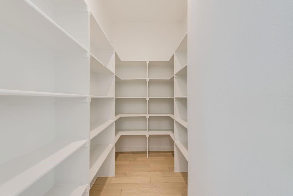 547 Embargo Drive Fate, TX 75189 - Photo 13 of 36 a view of a room with shelf on the wall