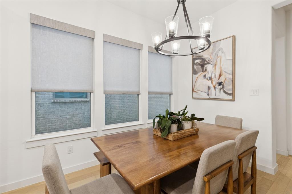 547 Embargo Drive Fate, TX 75189 - Photo 14 of 36 a dining room with furniture and window
